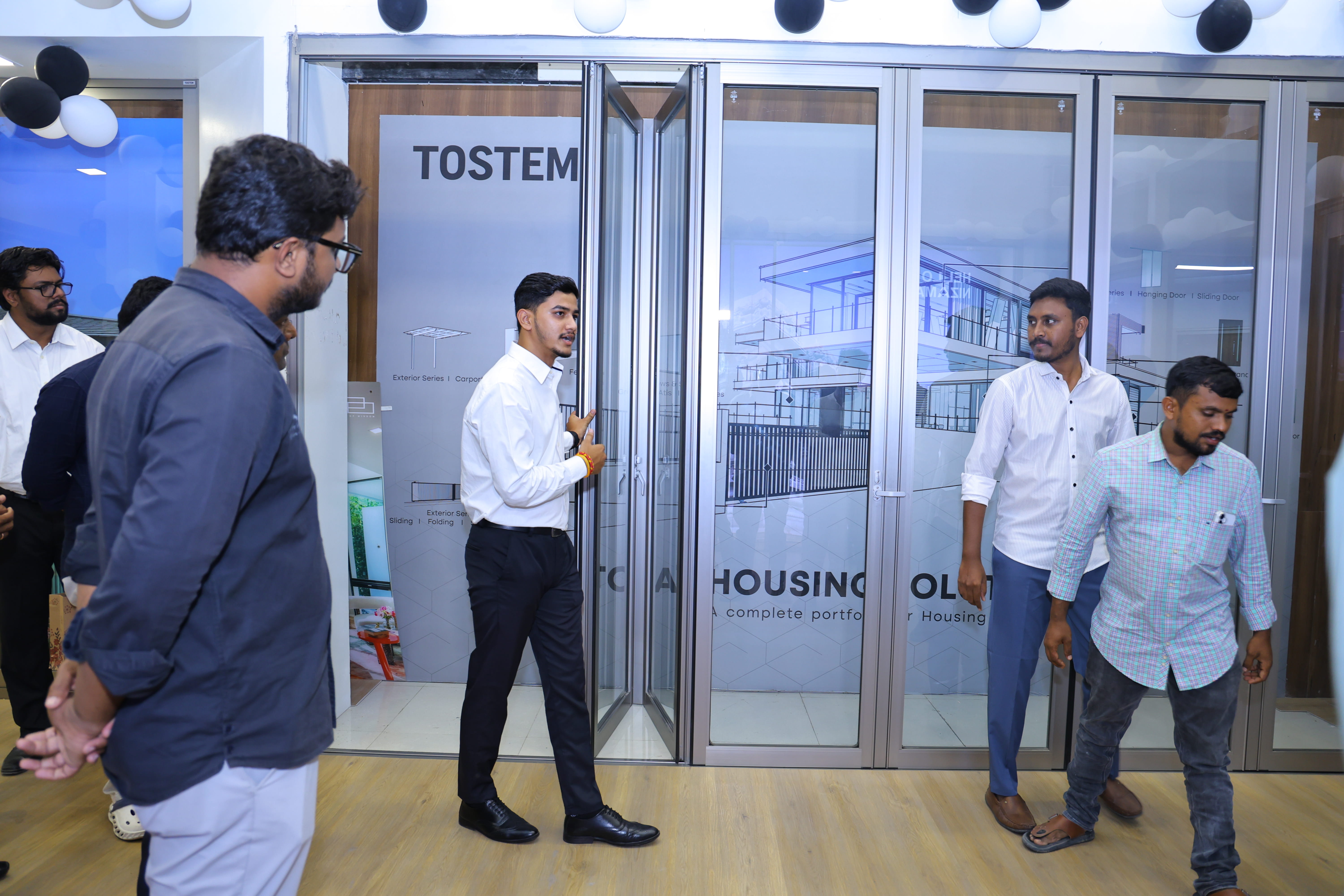 Grand opening of TOSTEM studio's cistern aluminium windows and doors at Nizamabad. detail photo