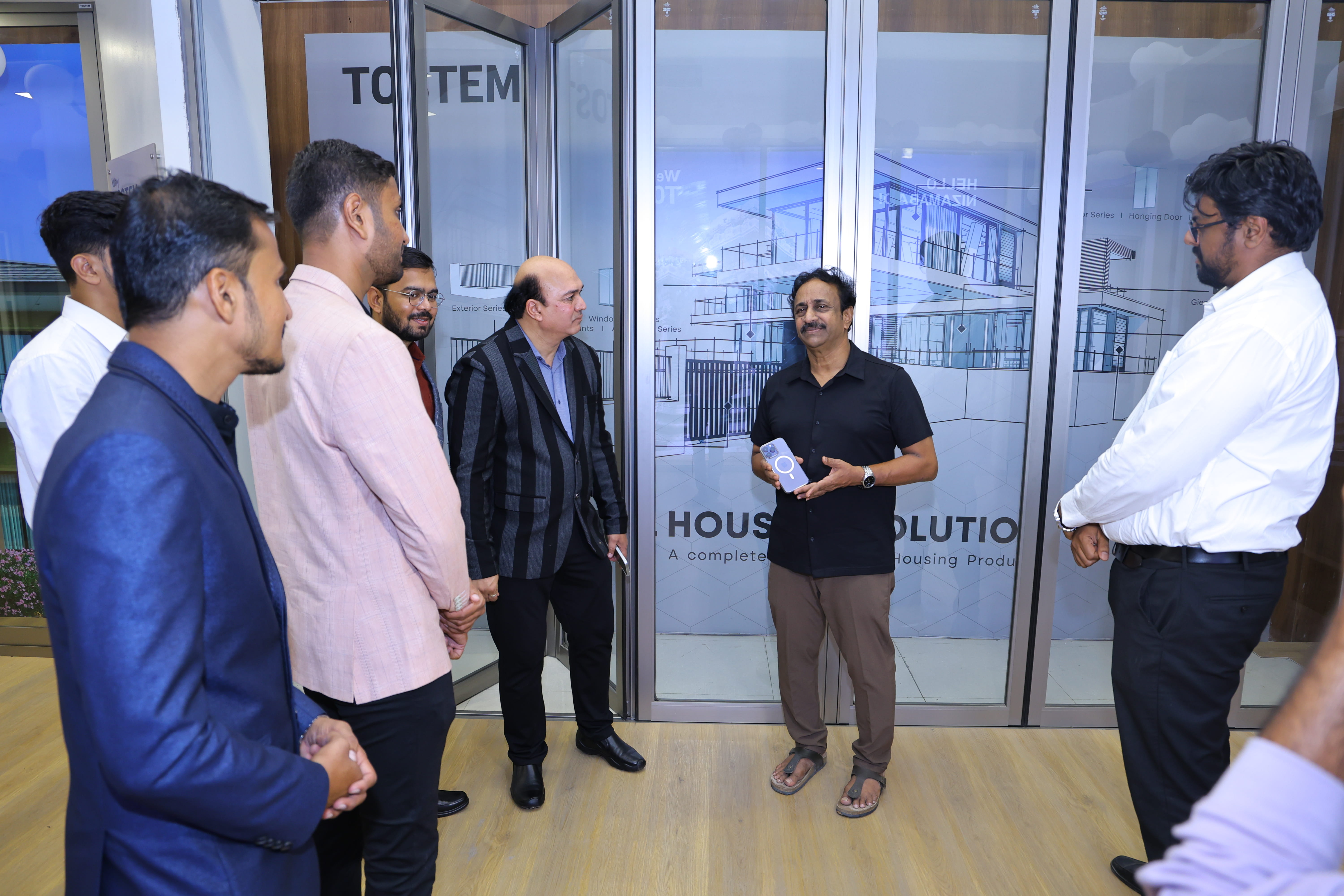 Grand opening of TOSTEM studio's cistern aluminium windows and doors at Nizamabad. detail photo